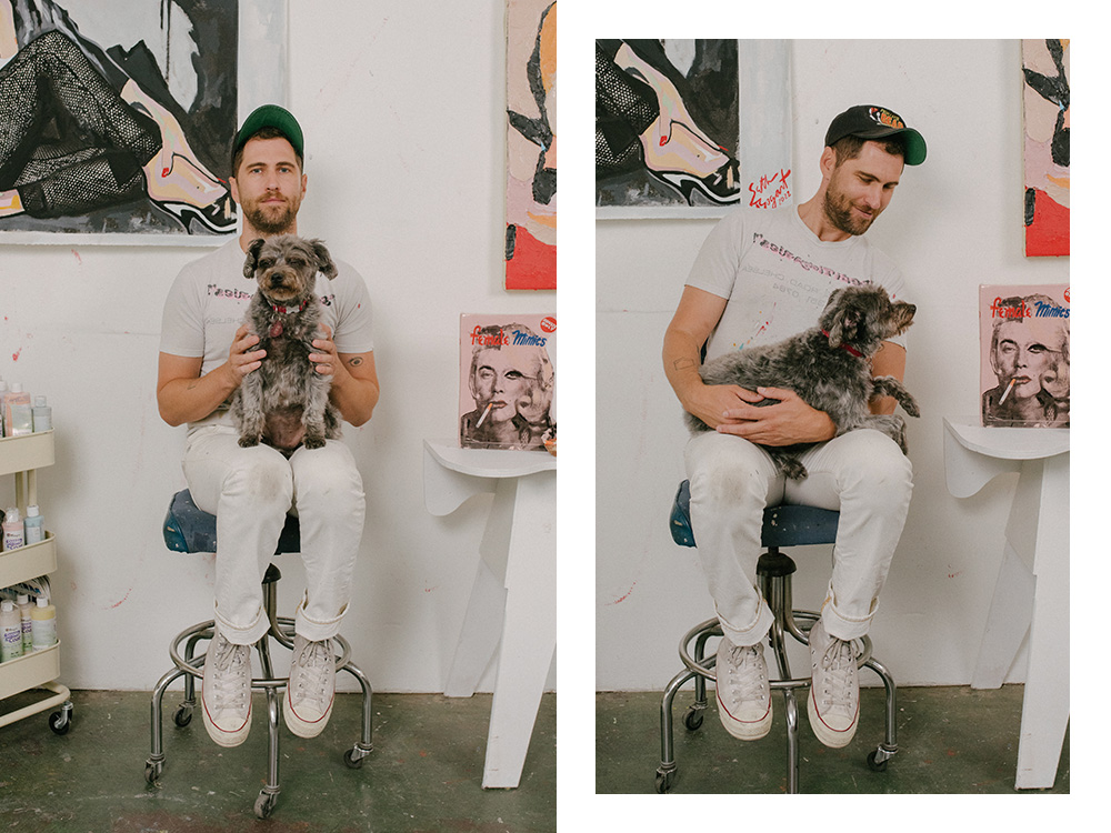 Seth Bogart holds his dog, Stix