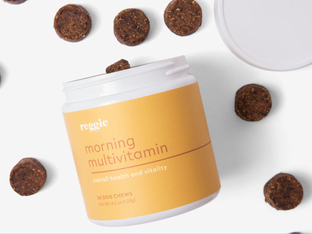 reggie treats in yellow container