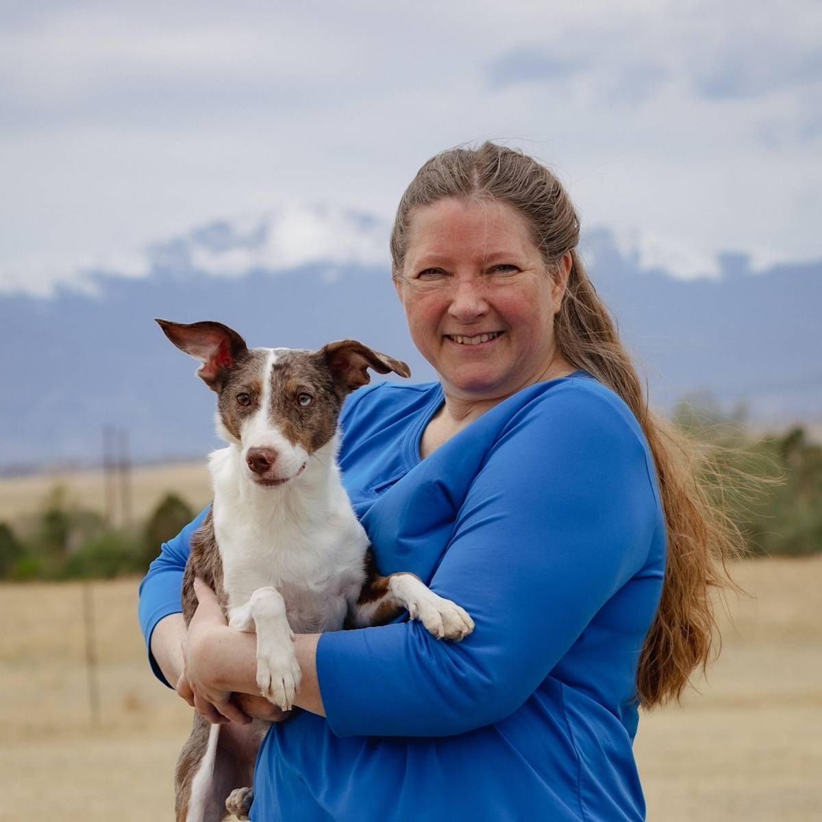 Lorrie Reynolds poses with her dog