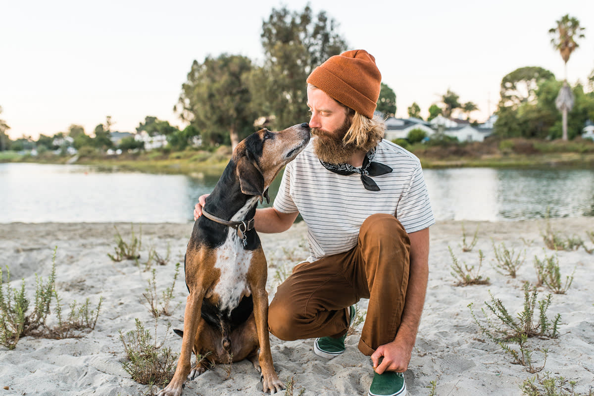 person with senior dog