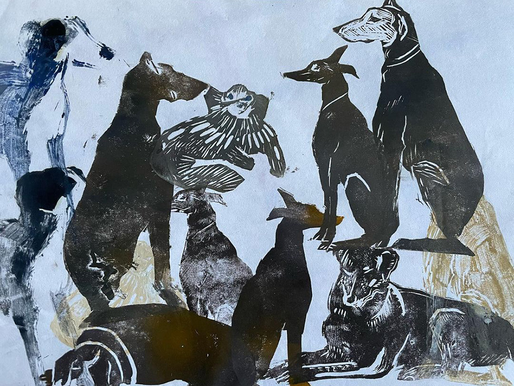 prints of black dogs on a blue background