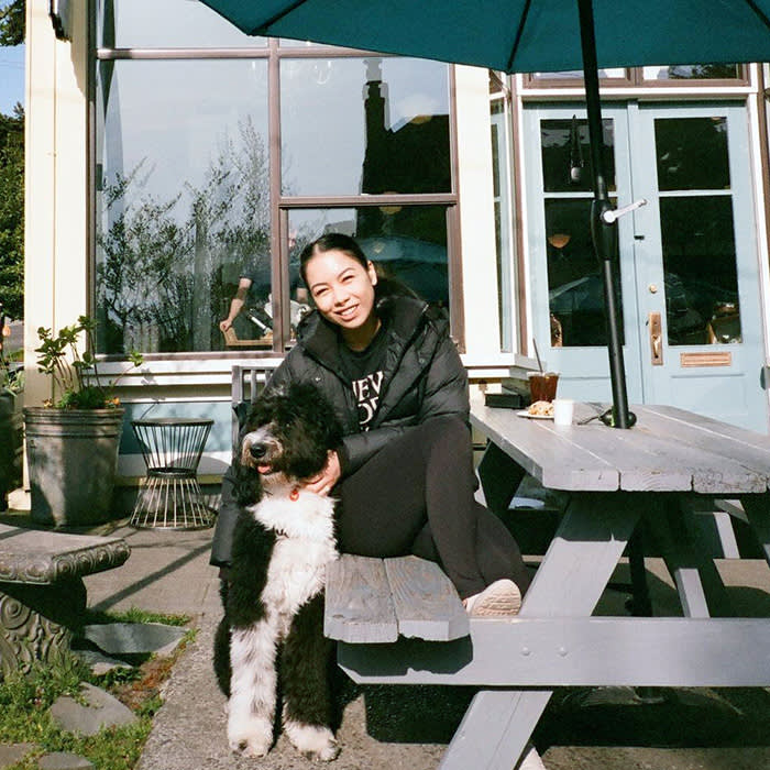 a person with a dog at Volunteer Park Cafe