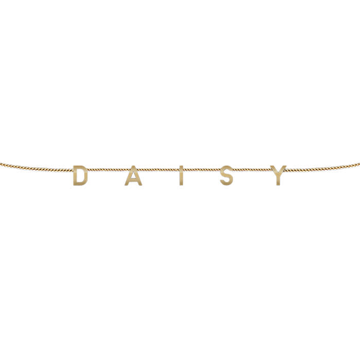 Gold custom necklace that reads "Daisy"