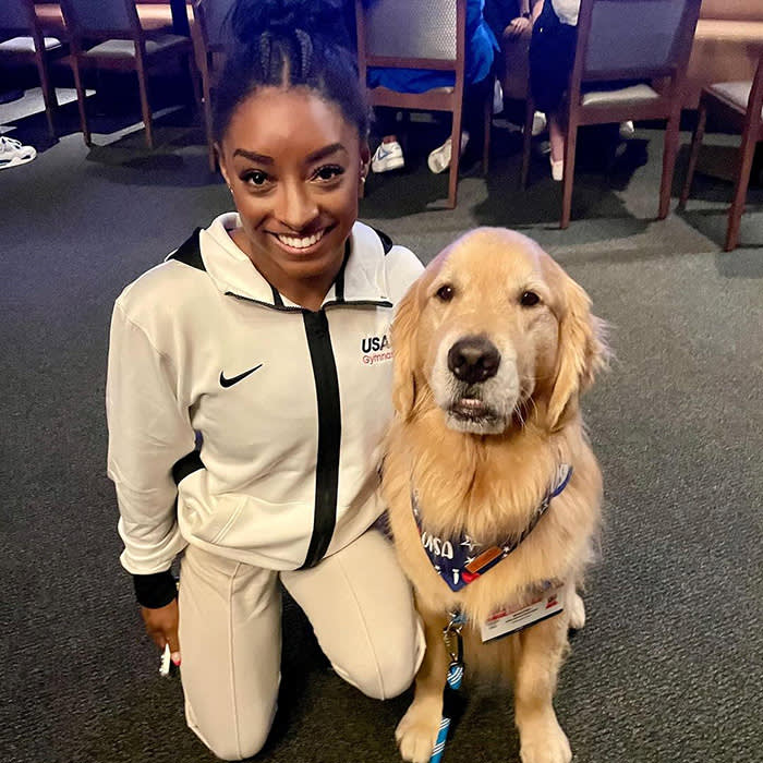 Beacon, Olympics therapy dog, with Simone Biles