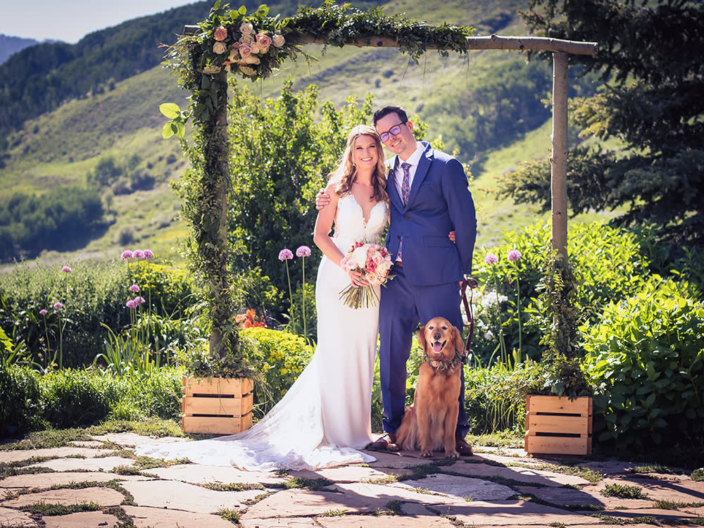 couple getting married with dog