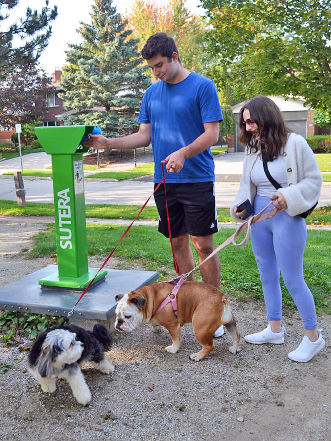 dog parents using the Sutera Puppy Poop Power device