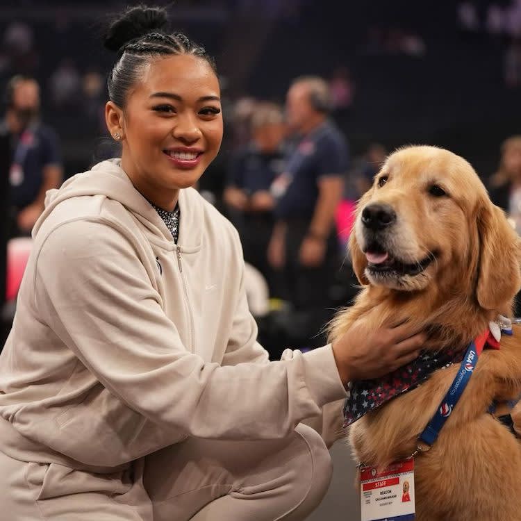 Suni Lee with Beacon, the USA Gymnastics' therapy dog