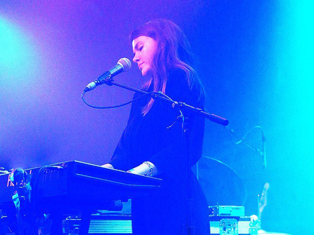 Tess Roby on stage performing