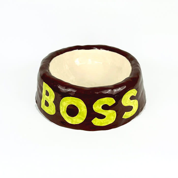 dog bowl with "Boss" written in yellow type