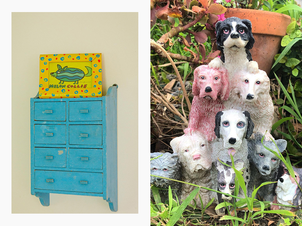 dog sculpture and geese in a flower pot