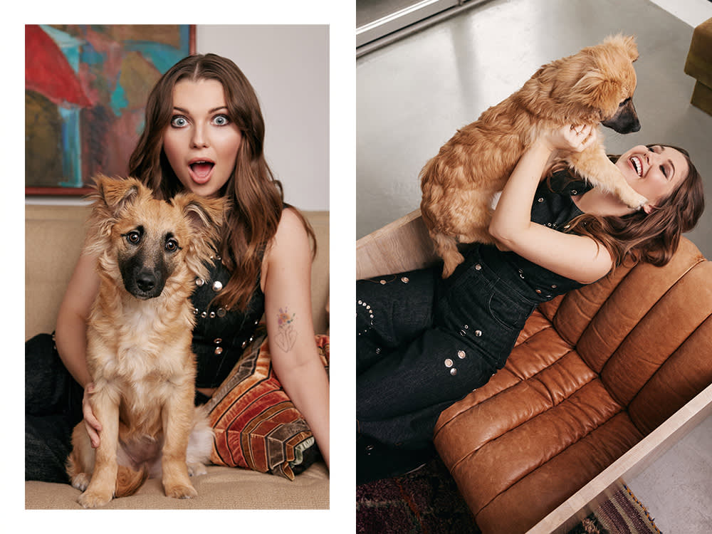 Samantha Hanratty on a couch with her dog