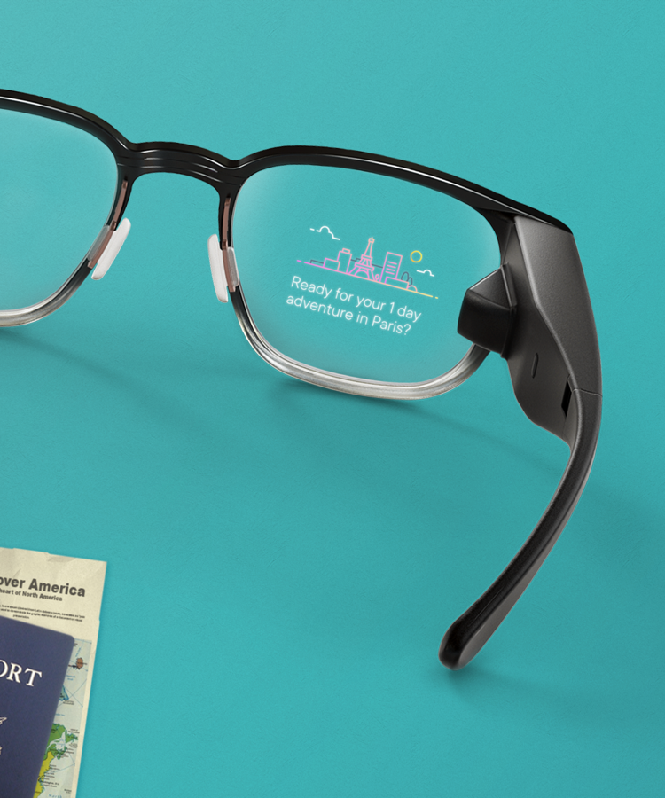 Smart glasses with a city-scape image and the text 'Ready for your 1 day adventure in Paris?' displayed on the lens.