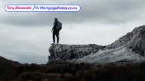 Man standing on the top of rocks