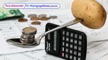 Potato and money balancing on calculator