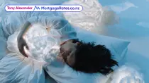 Girl hugging a cloud while sleeping