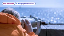 Back view of person looking through binoculars
