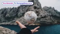 Person holding a globe