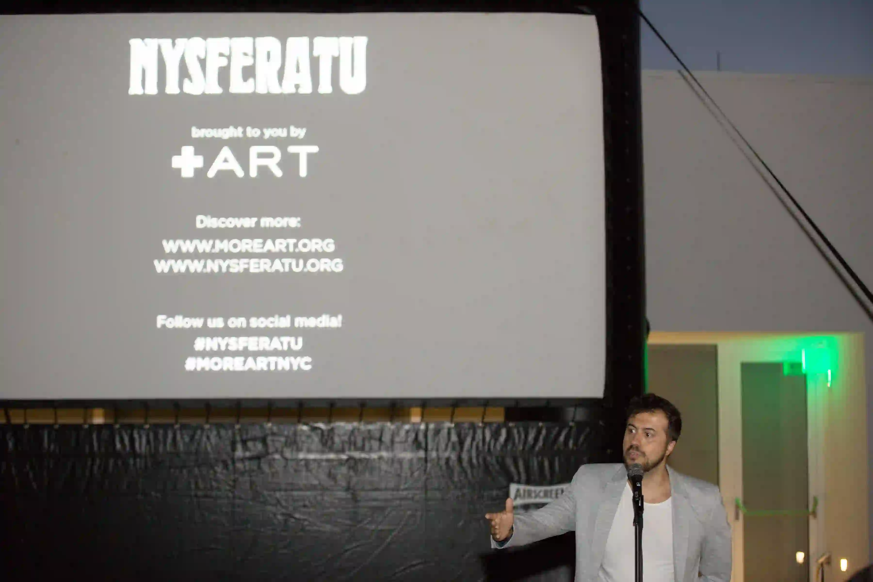 Andrea Mastrovito gives opening remarks prior to his film screening at Magazzino Italian Art