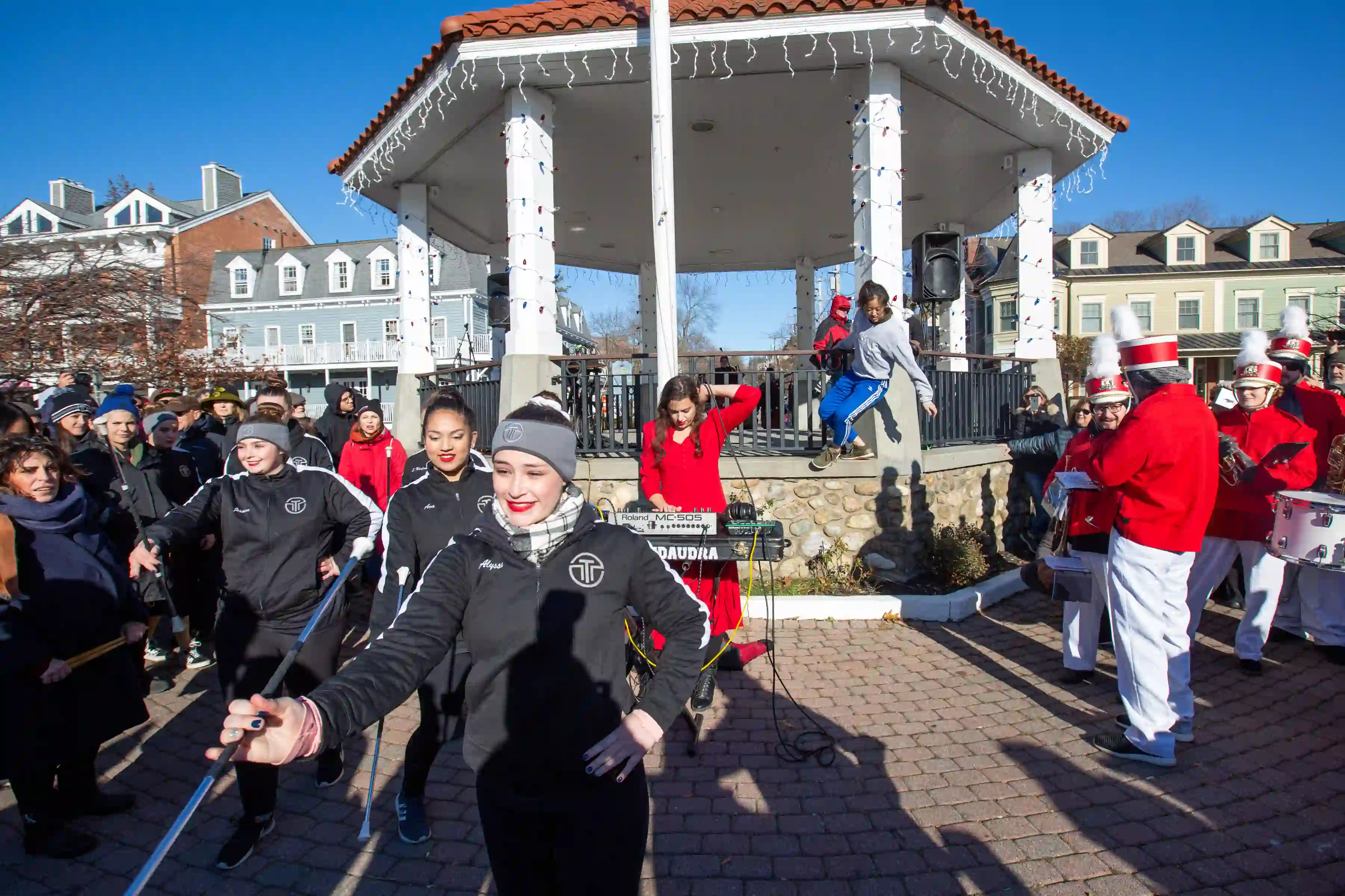 Performers in front of a gazebo at the Marinella Senatore and The School of Narrative Dance Performance event, 2019