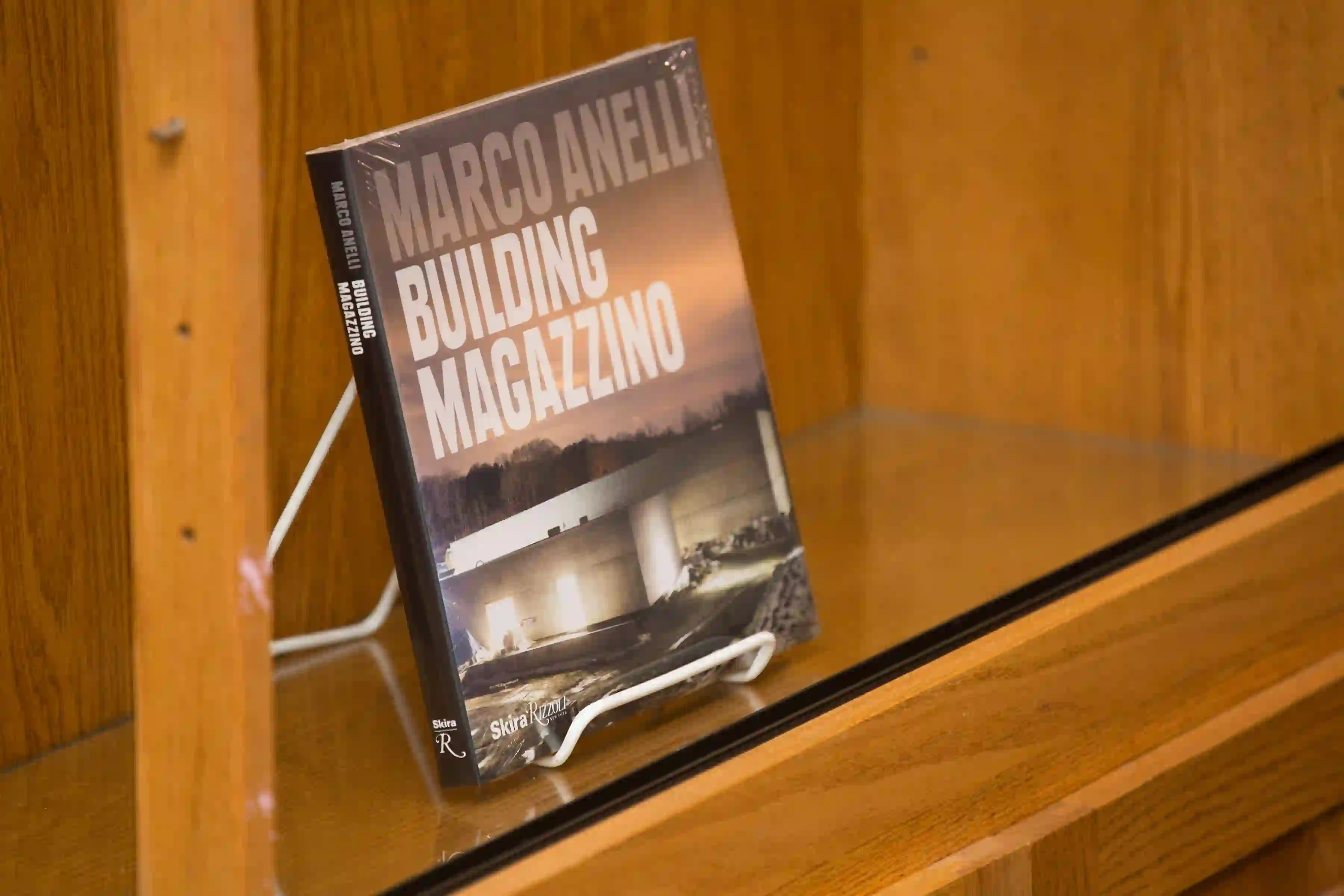 Installation view of Marco Anelli: Building Magazzino book on display