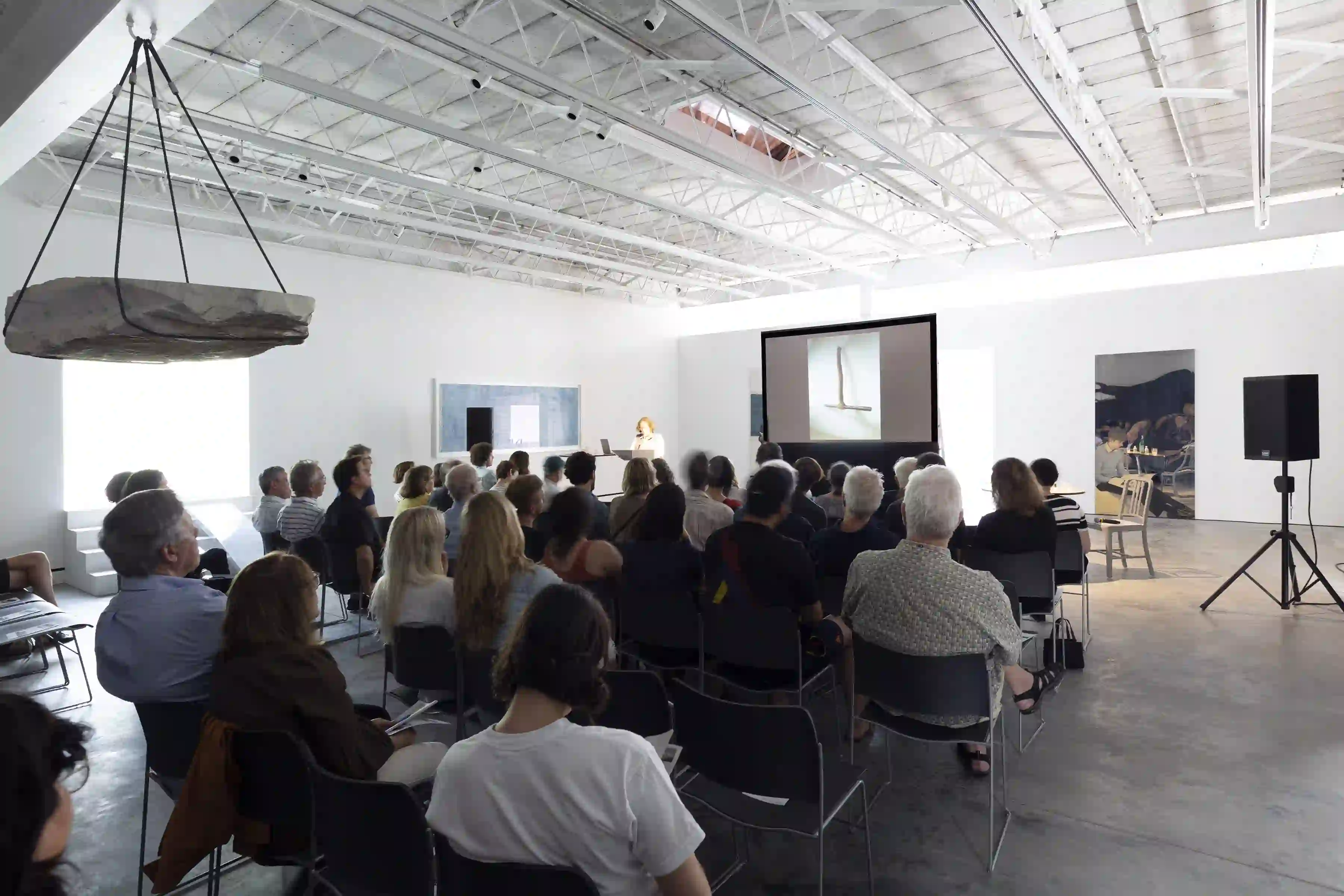 Photo of Independent Scholar and Curator, Anne Rorimer giving her lecture, "Giovanni Anselmo: 1965 to the Present," on June 8, 2019