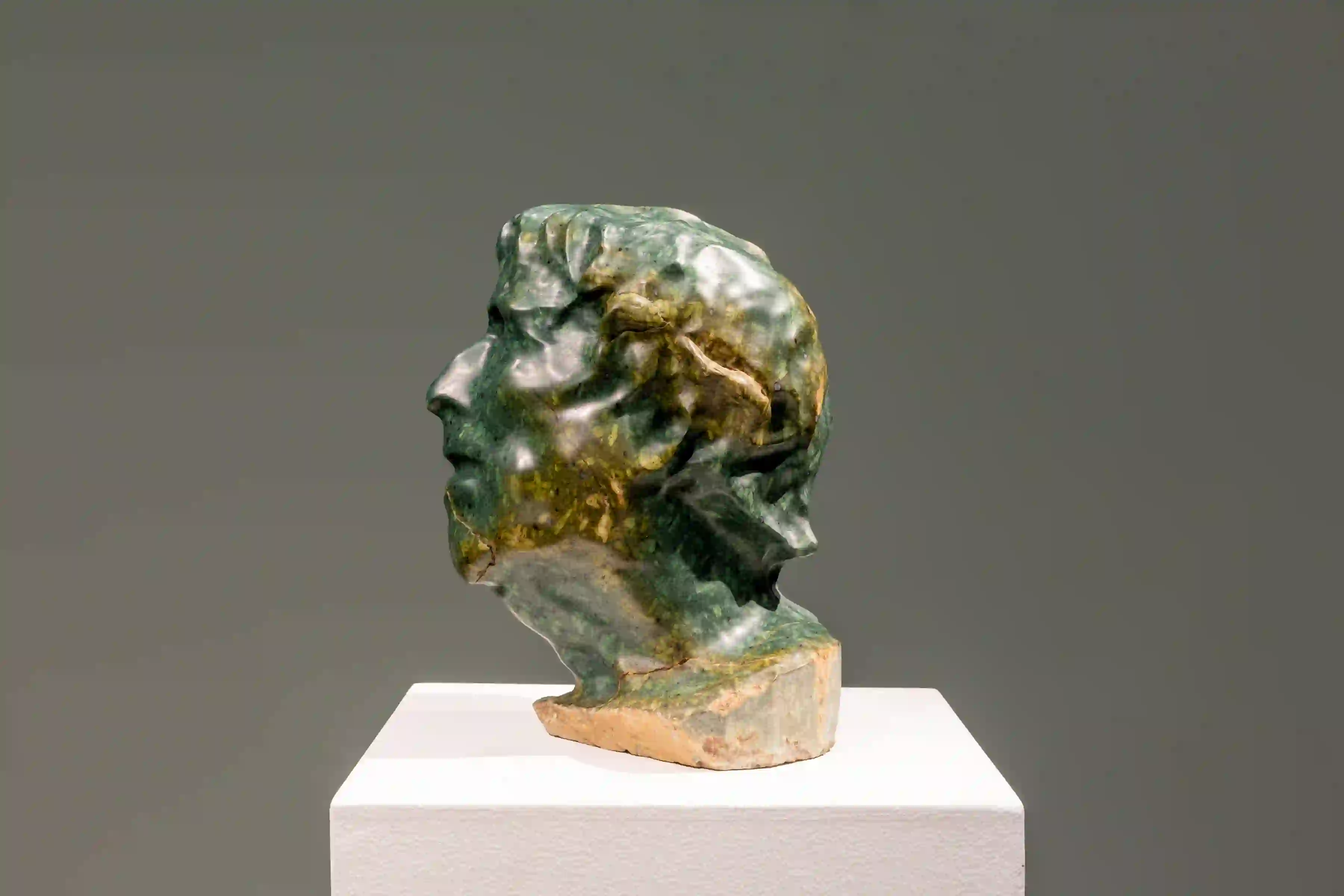 Namsal Siedlecki, Estinti, 2021, Serpentino antico marble, 13.8 x 13 x 10.2 in. (35 x 33 x 26 cm).