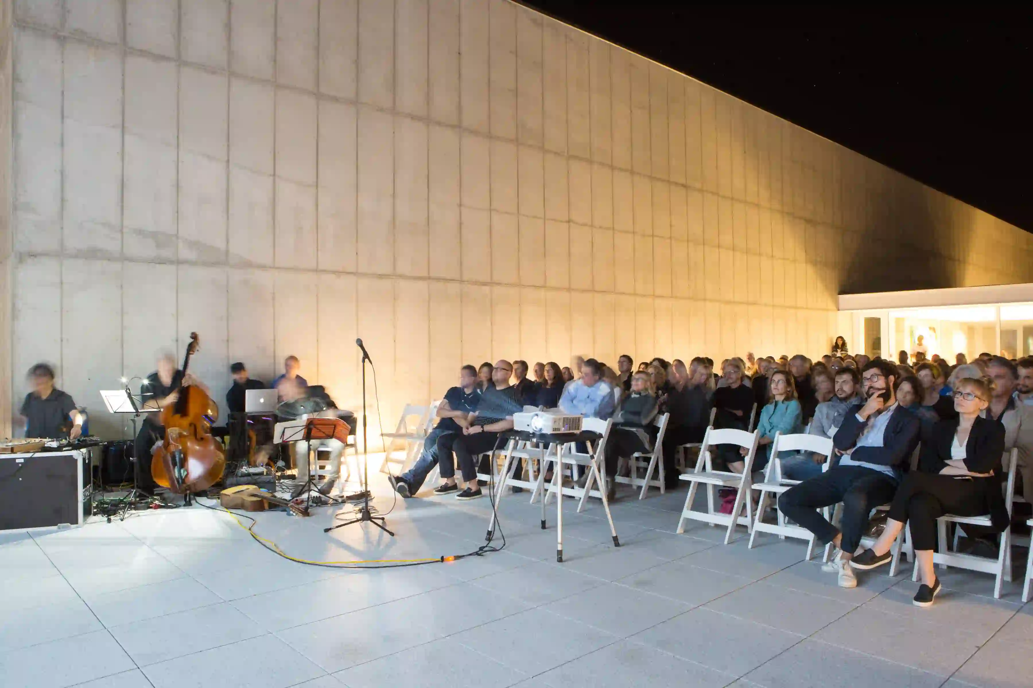 A captivated audience enjoys Mastrovito's film "NYsferatu: Symphony of a Century" set to the musical accompaniment of the Marco Cappelli acoustic trio