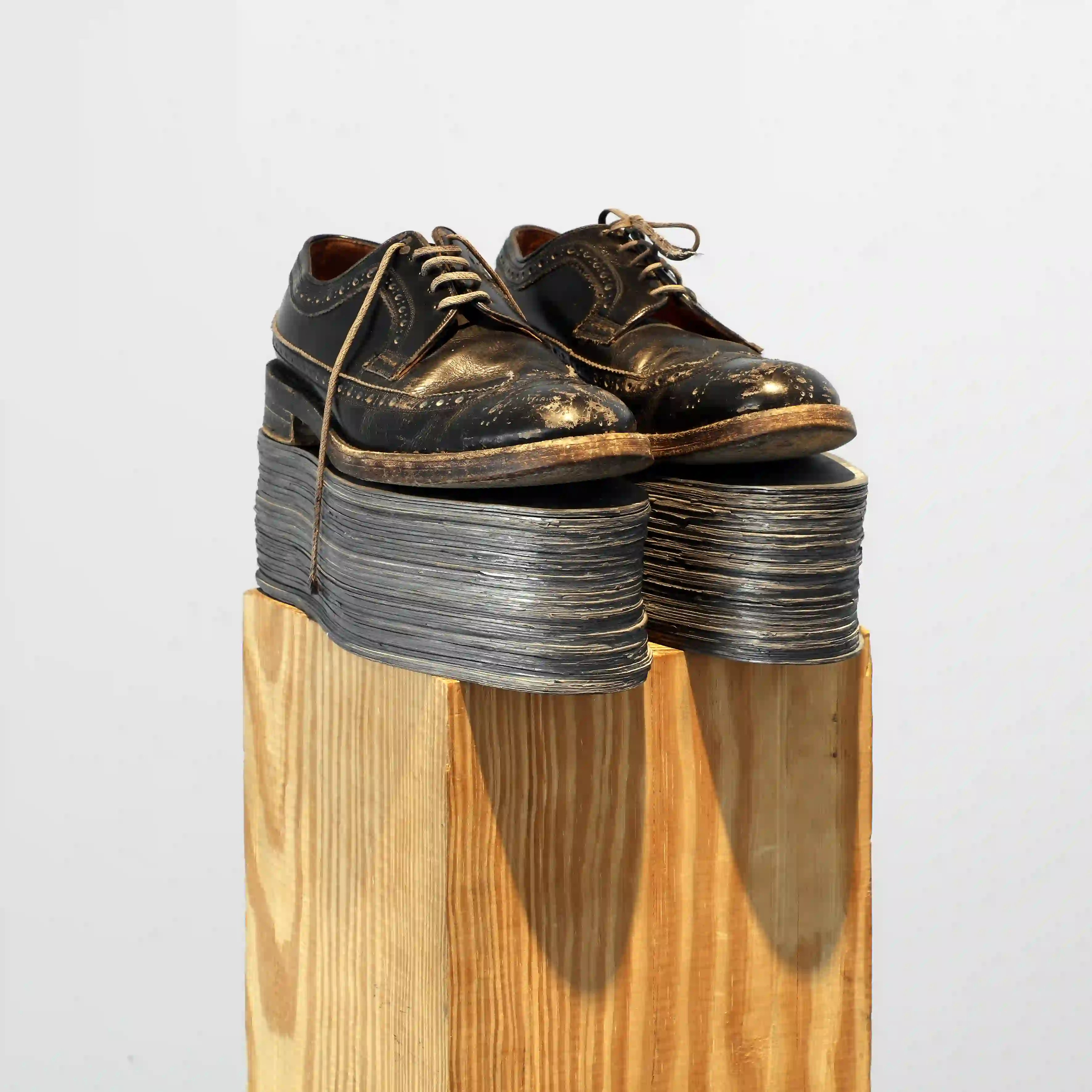 Jannis Kounellis: Untitled, 1989, leather shoes, lead insoles