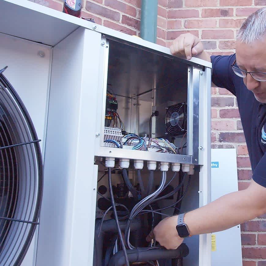 JA with Tyneham heatpump banner