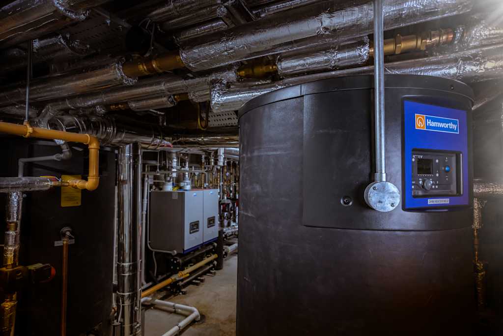 Hamworthy Stratton boiler cascade and DRSG water heater in plant room