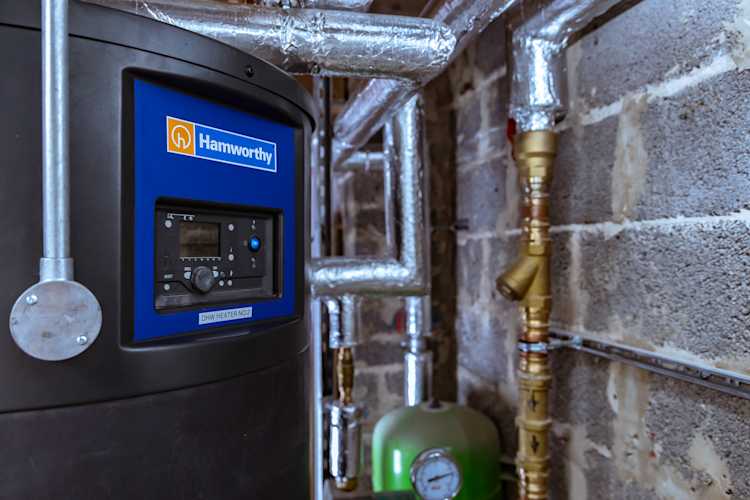 What is stratification in water heaters?