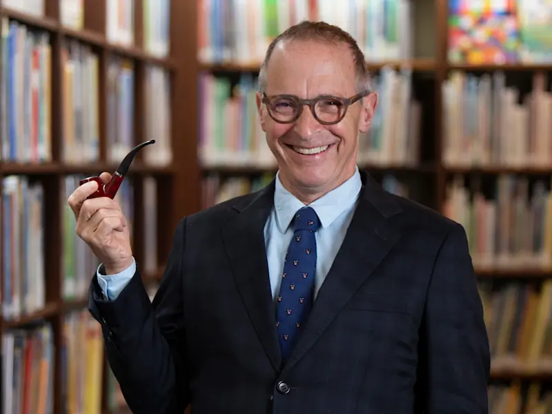 Image > David Sedaris > Library smiling
