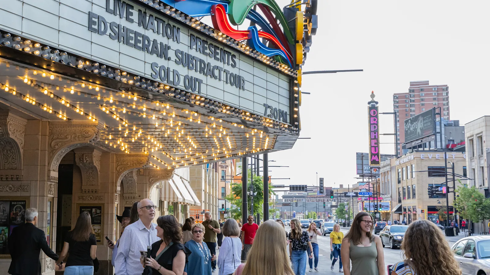 Person Taking a Photo of the Orpheum Marquee