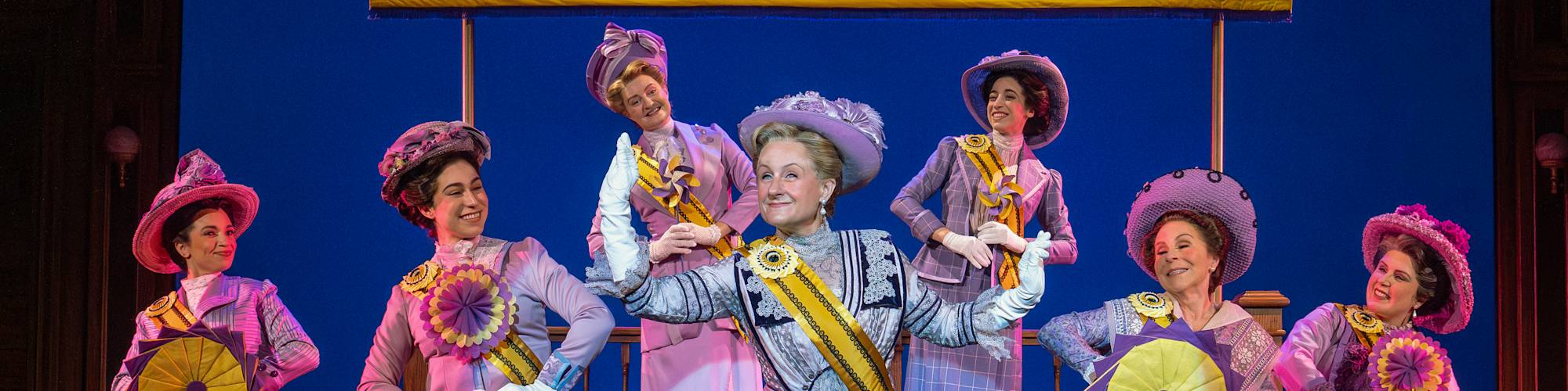 1 - Jenn Colella as Carrie Chapman Catt and Suffs Broadway Company Large