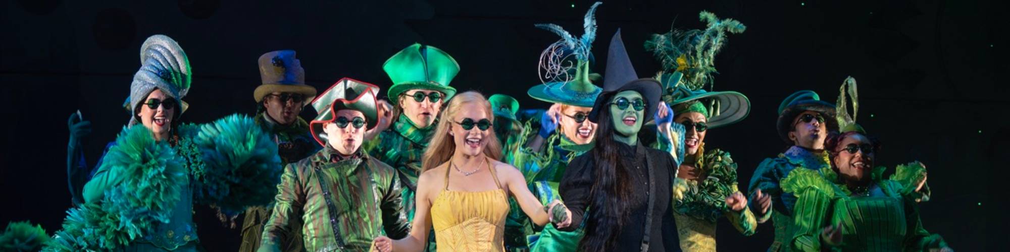 Claudia Bennett as Glinda and Aline Mayagoitia as Elphaba (center) and the North American Touring Company of WICKED, photo by Joan Marcus (0871r) Large