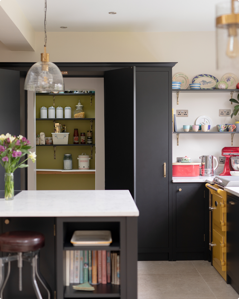 Sleek cabinets, spacious pantry shelves and unique appliances at a completed project in Merton