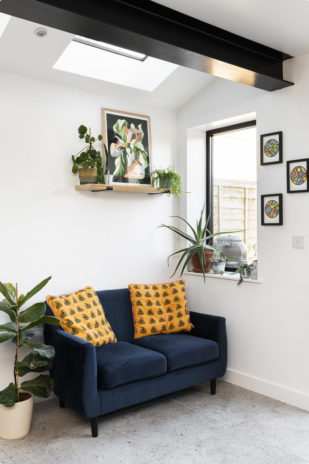 Indoor plants and plenty of natural light make for a calm aesthetic 