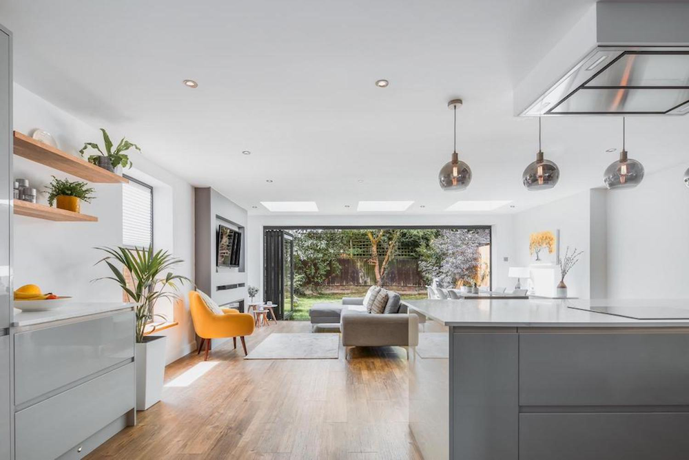 A sleek open-plan kitchen in Runnymede, designed by Resi