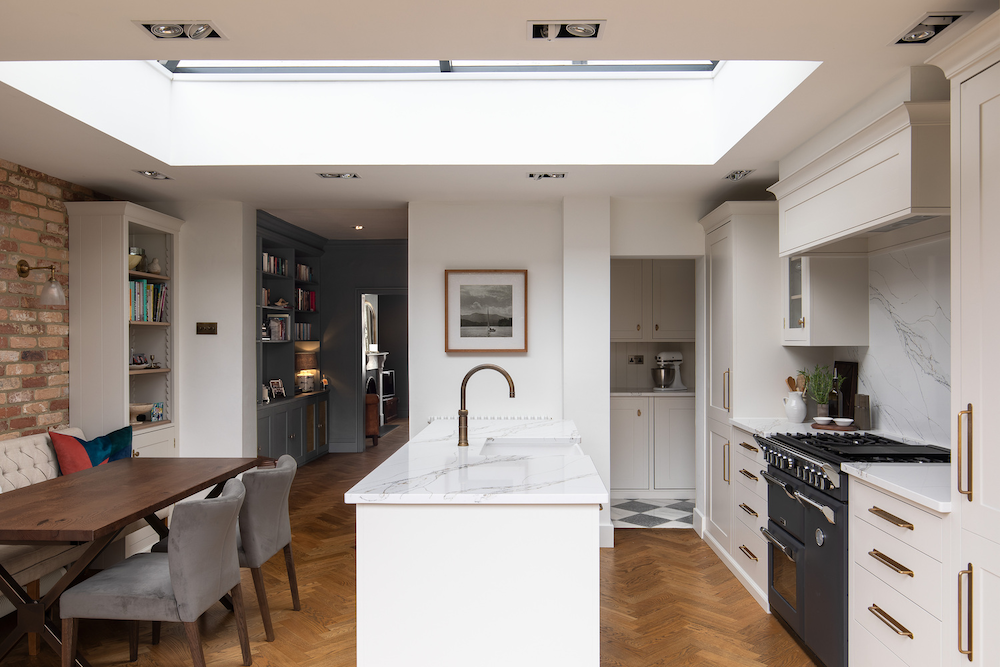 An elegant open plan kitchen extension with a cosy dining area
