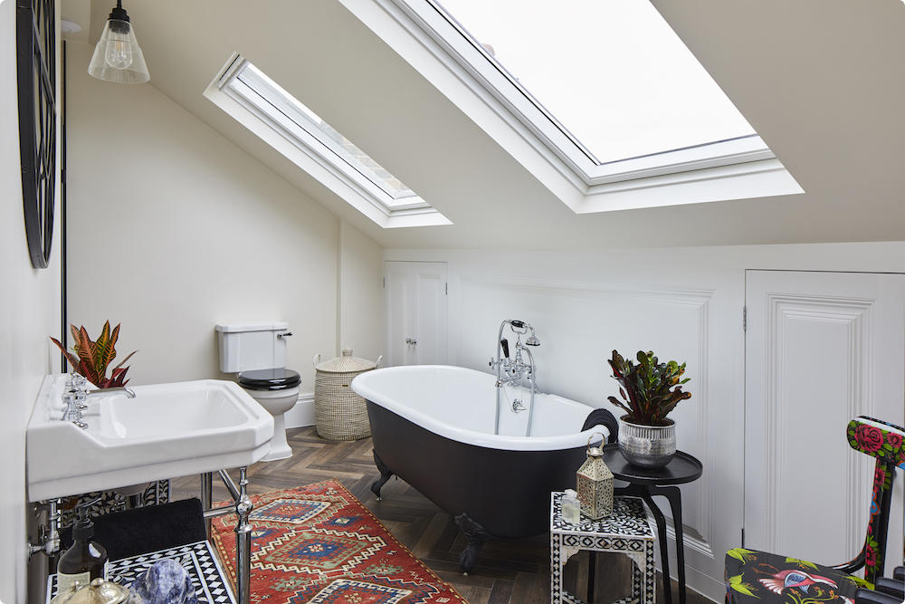 Loft bathroom with skylights