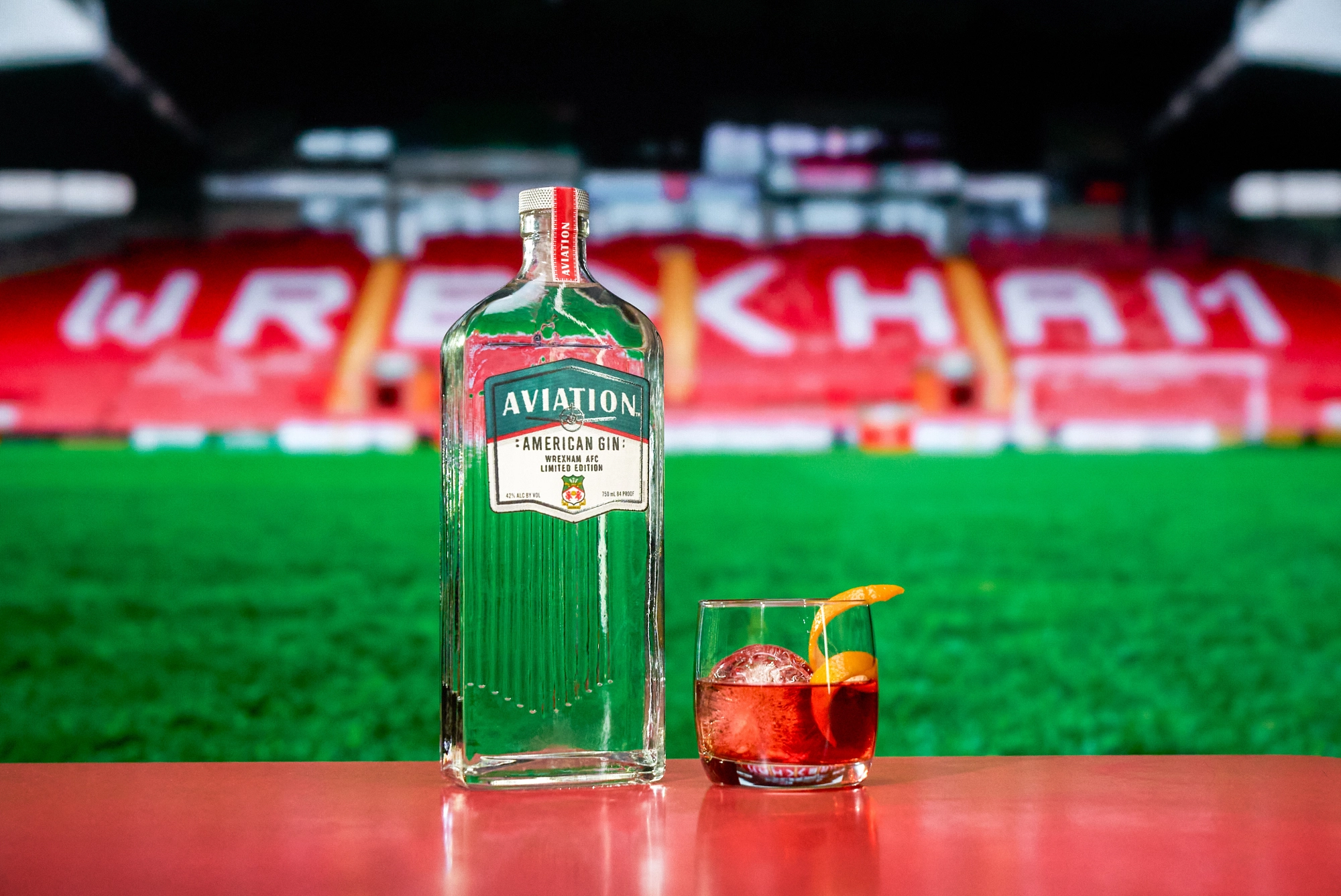 Aviation Gin: Wrexham Limited edition bottle with glass of cocktail
