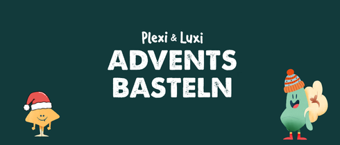 Hier sieht man weihnachtlich gekleidete Plexu und Luxi Maskottchen