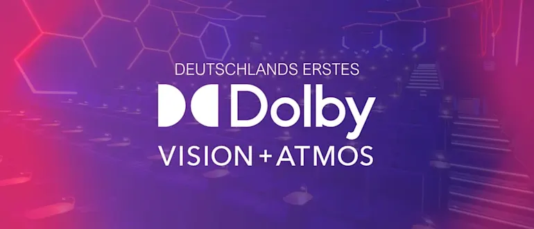 Dolby Vision + Atmos Logo mit Saal 1 in Nürnberg im Hintergrund