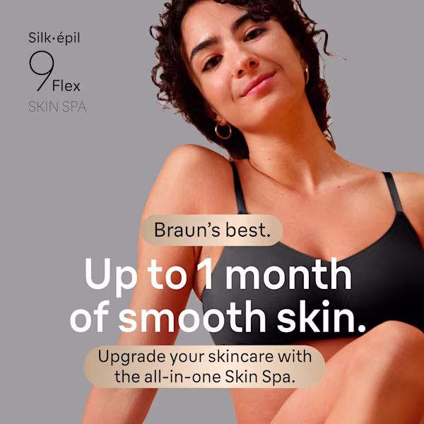 Appreciation shot of a women sitting on the floor and looking into the camera. Appreciation shot of a women sitting on the floor and looking into the camera.