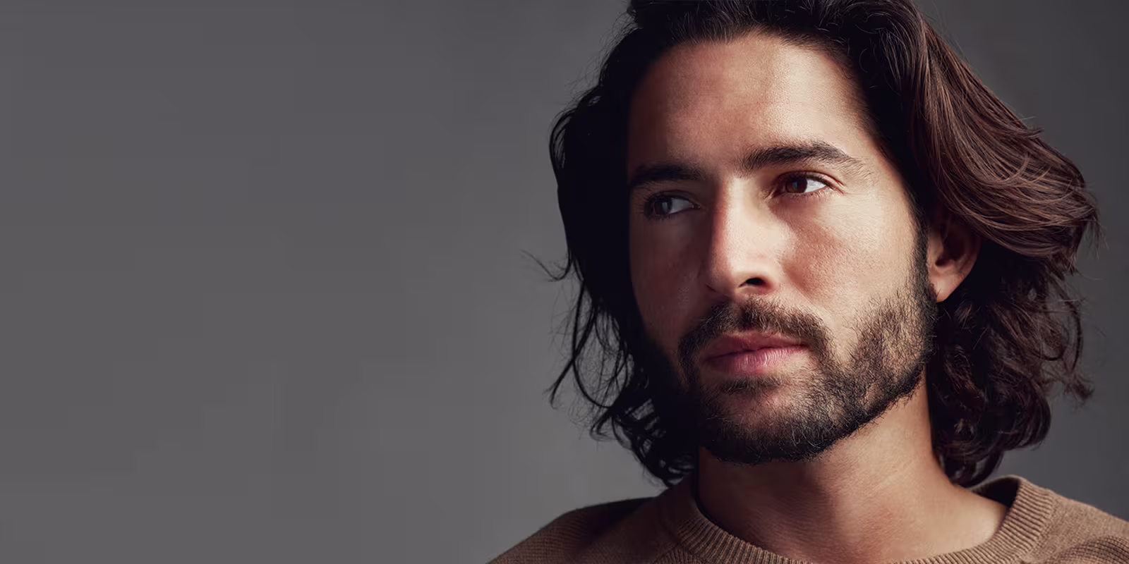 Man with a well-maintained beard.