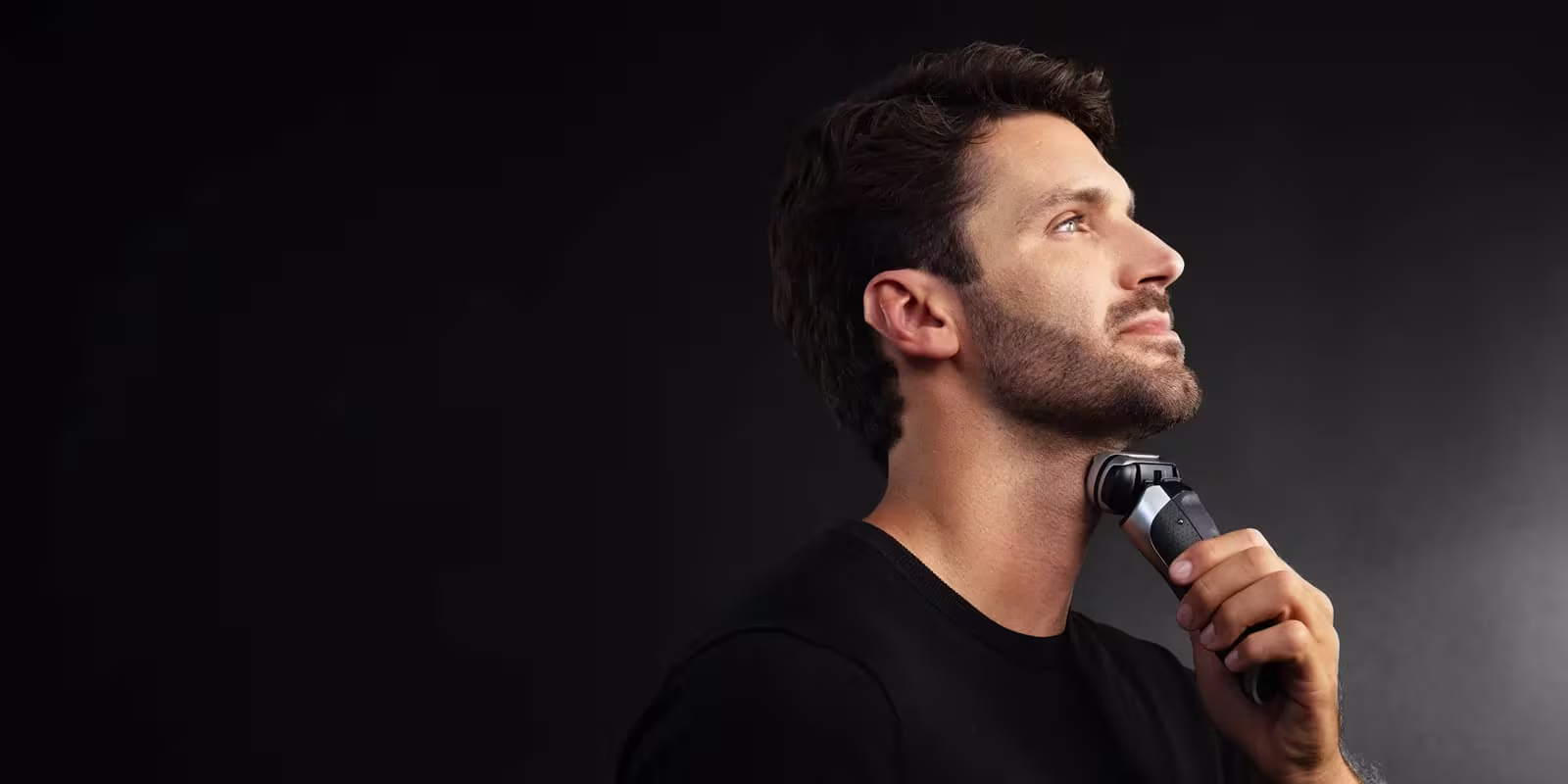 Men using Braun trimmers and shavers for trimming, shaving, and grooming. Men using Braun trimmers and shavers for trimming, shaving, and grooming.