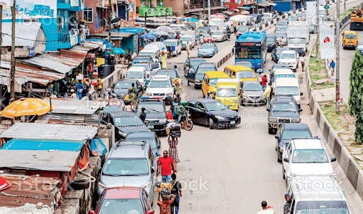 parkwell; traffic situation on Lagos road caused by on-street parking activities