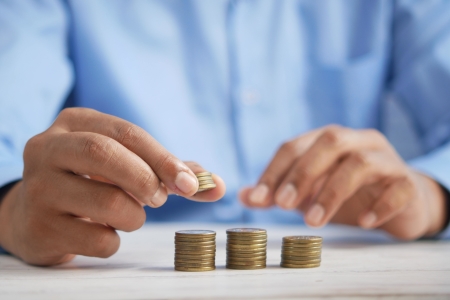 Picture of a person counting coins