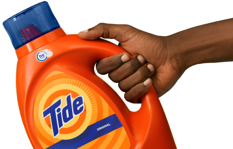 A person holding a Tide Original Liquid Detergent product