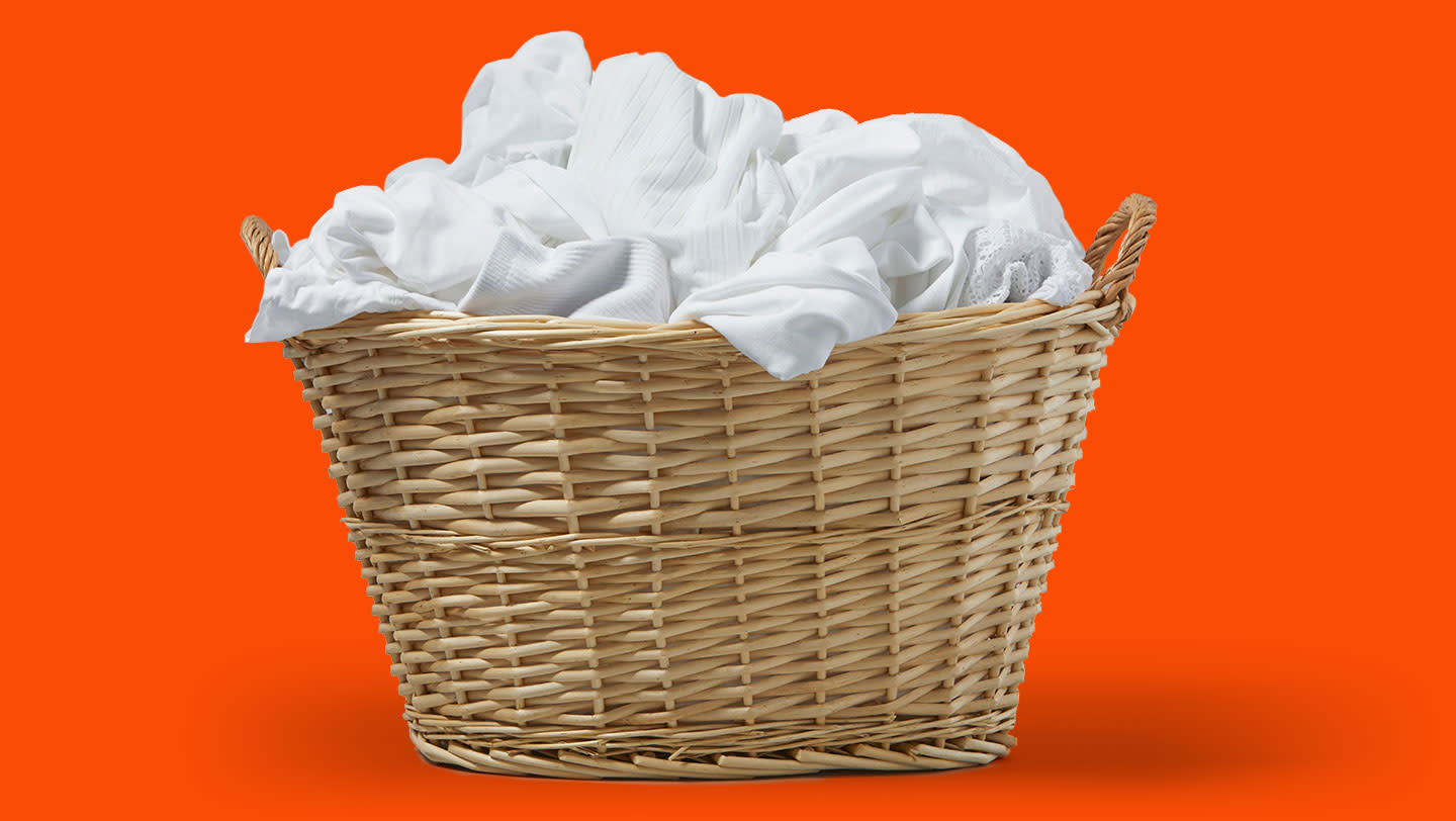 White garments in a woven laundry basket